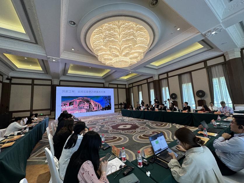 5月30日，“共筑文明共同體——博物館國際合作新愿景”平行論壇在甘肅敦煌舉行。圖為論壇現(xiàn)場。（中新社記者丁思 攝）